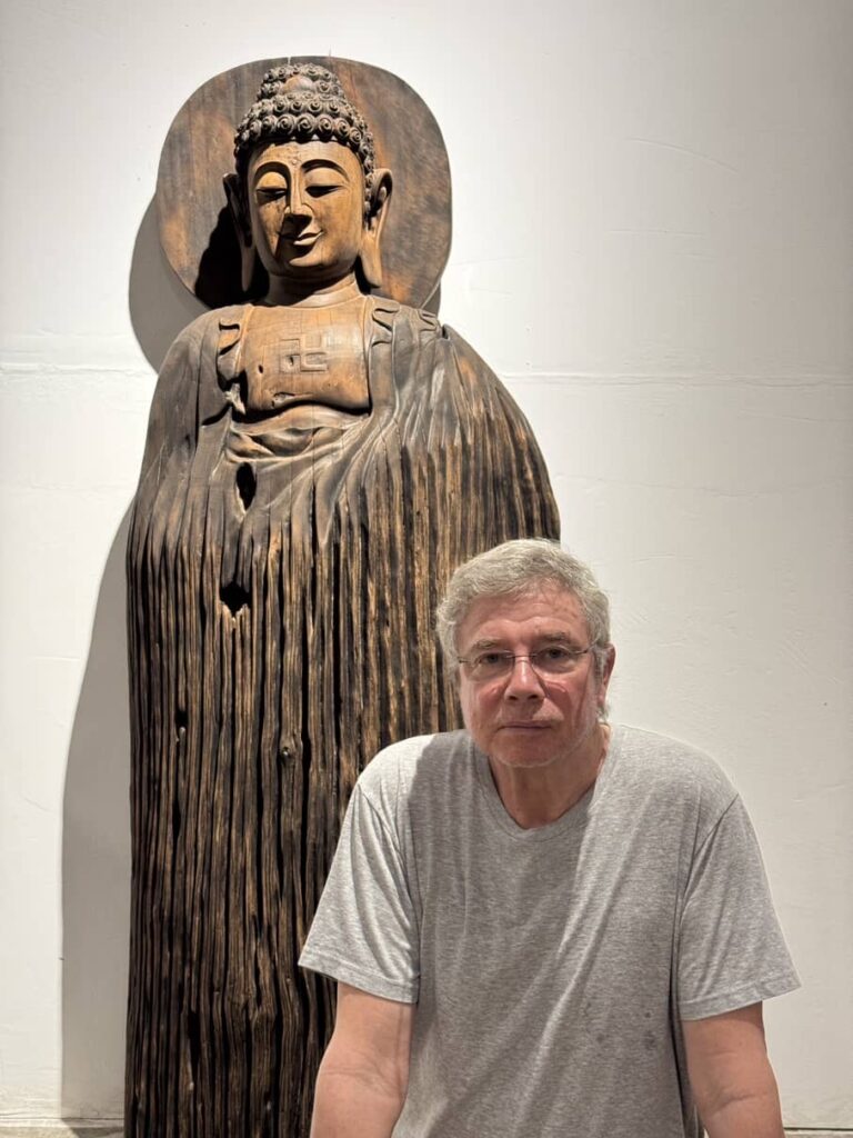 In front of a Buddha